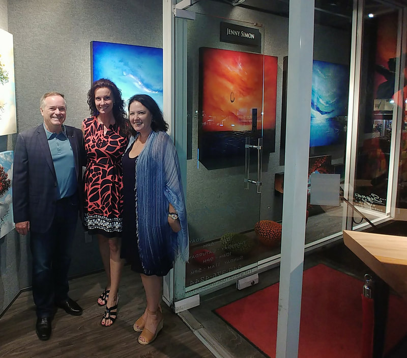 Jenny Simon with clients at Signature Gallery