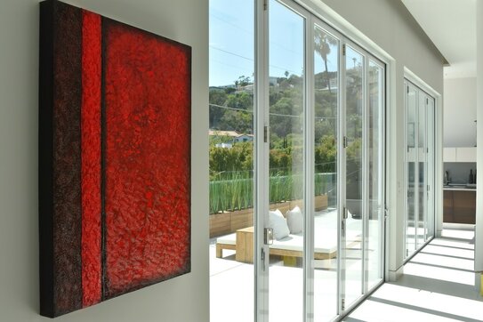 Red textured Jenny Simon painting in multimillion dollar home by architect Homayoun Neydavoud in Hollywood Hills